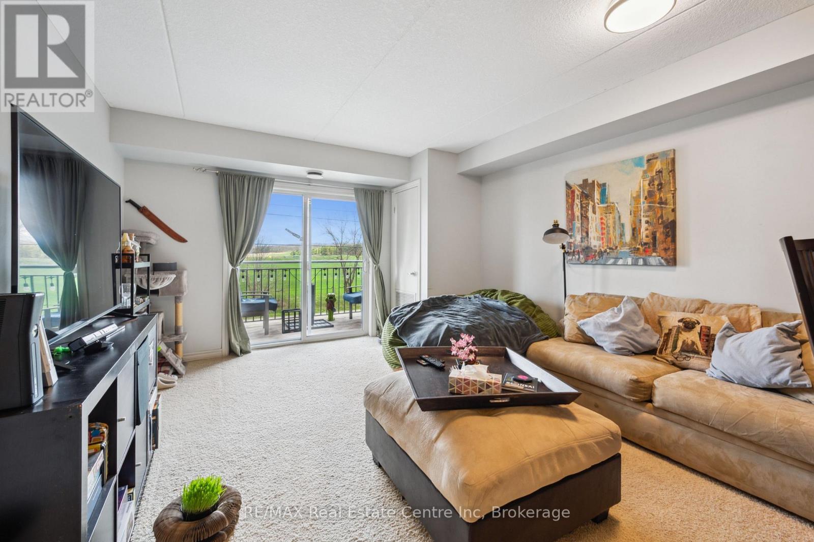 303 - 19 Waterford Drive, Guelph, Ontario  N1L 0G8 - Photo 6 - X12359047