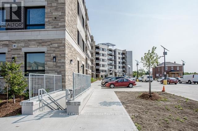 309 - 33 Whitmer Street, Milton, Ontario  L9T 8P9 - Photo 2 - W12359591
