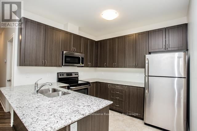309 - 33 Whitmer Street, Milton, Ontario  L9T 8P9 - Photo 8 - W12359591