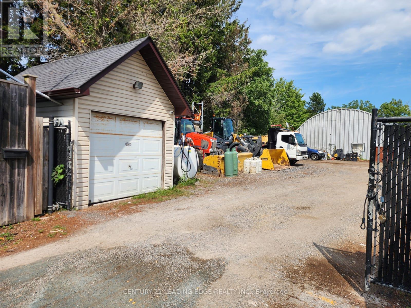 Rear Garage - 10873 Kennedy Road, Markham, Ontario  L6C 1P2 - Photo 3 - N12360004