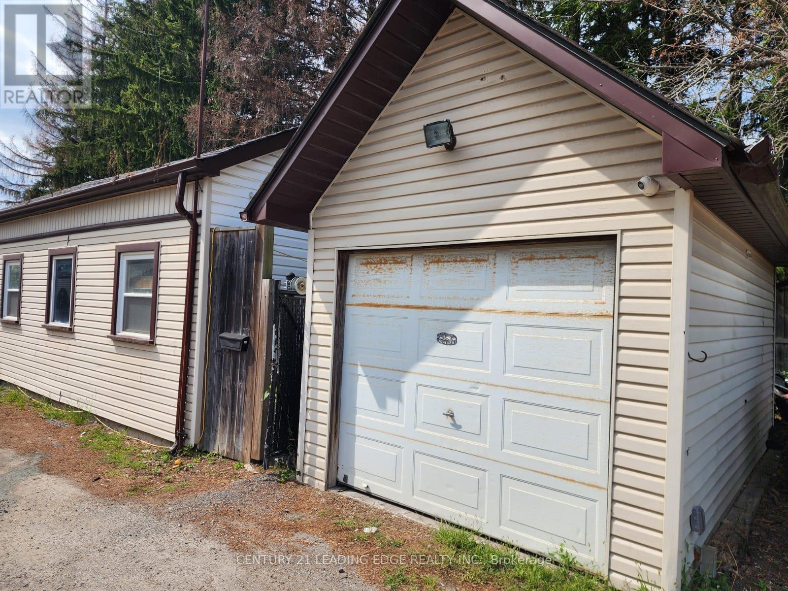 Rear Garage - 10873 Kennedy Road, Markham, Ontario  L6C 1P2 - Photo 4 - N12360004