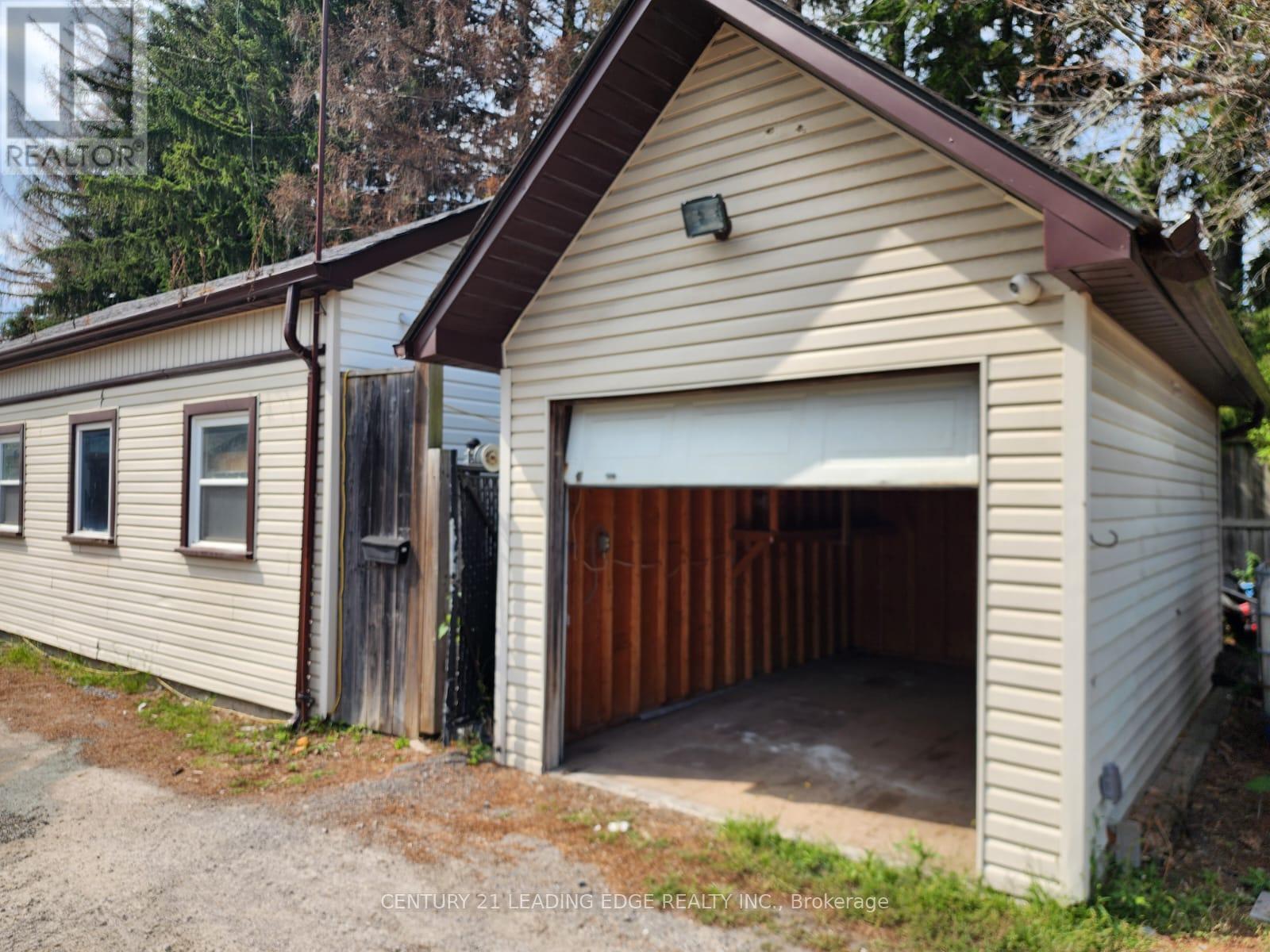 Rear Garage - 10873 Kennedy Road, Markham, Ontario  L6C 1P2 - Photo 5 - N12360004