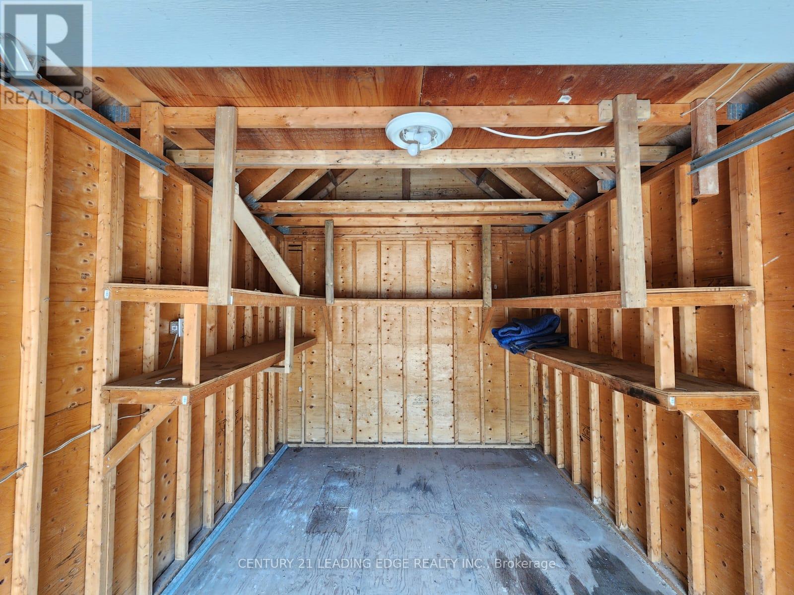 Rear Garage - 10873 Kennedy Road, Markham, Ontario  L6C 1P2 - Photo 7 - N12360004