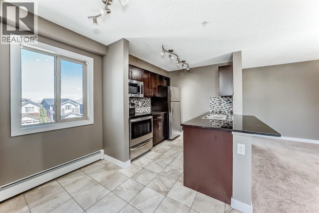 302, 15 Saddlestone Way Ne, Calgary, Alberta  T3J 0S3 - Photo 8 - A2248852