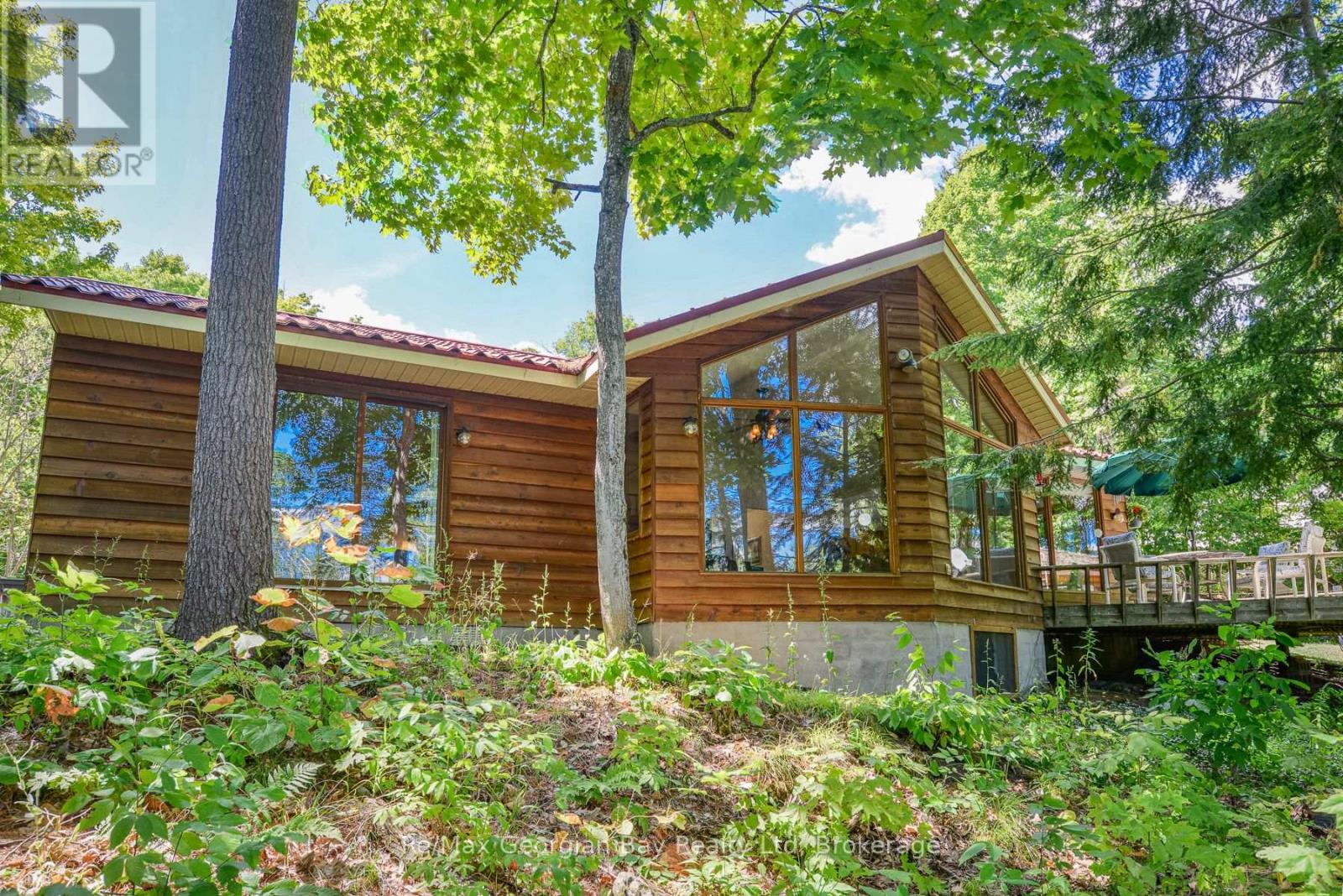 135 John Buchler Road, Georgian Bay (Baxter), Ontario  L0K 1E0 - Photo 3 - X12359743
