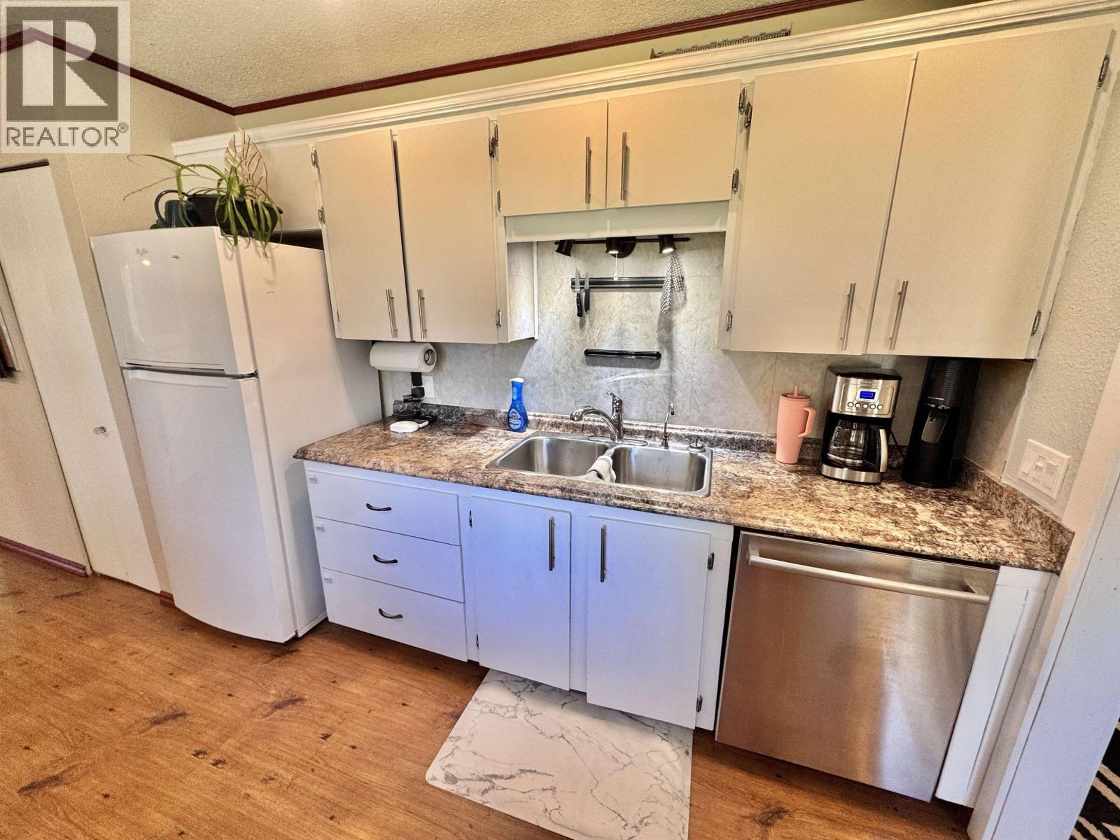 4990 Donsleequa Road, 108 Mile Ranch, British Columbia  V0K 2Z0 - Photo 7 - R3039380