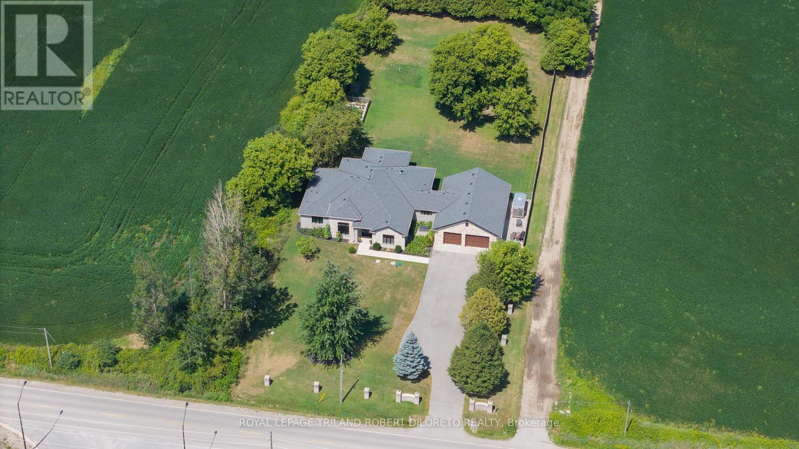 <div class="slider-price">$2,895,000</div><p>1445 Sunningdale Road W, London North, Ontario</p>