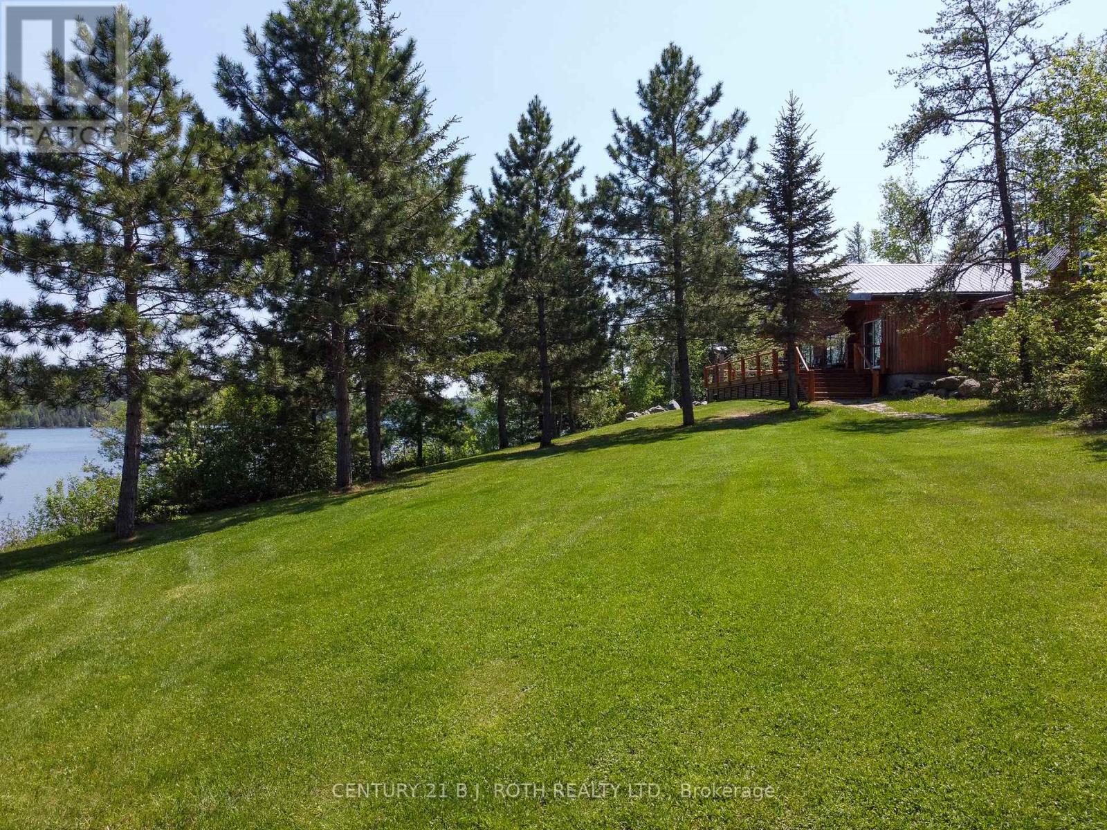 59 White Bear Court, Temagami, Ontario  P0H 2H0 - Photo 6 - X12362598
