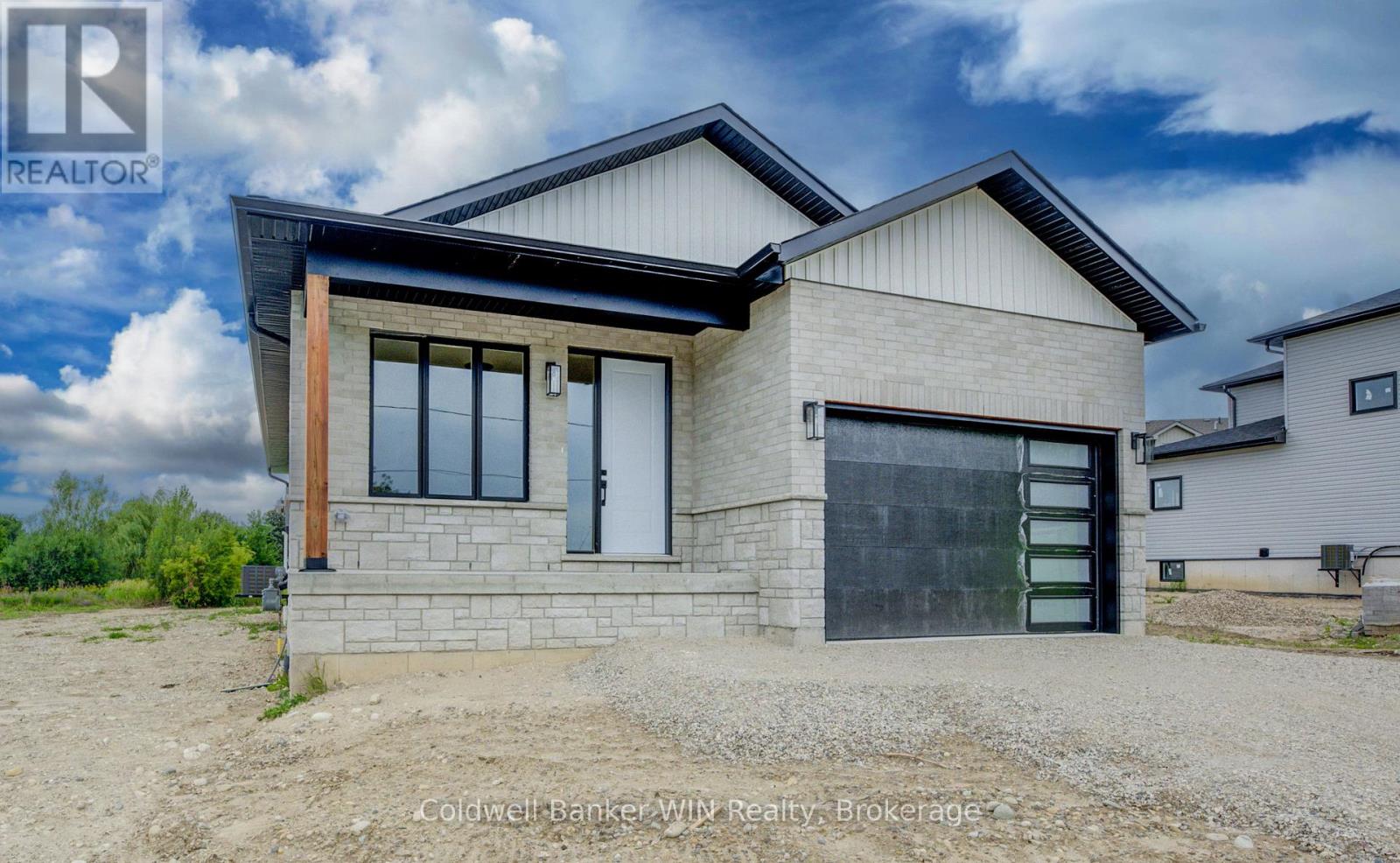 647 Martin Street, Wellington North, Ontario  N0G 2L3 - Photo 3 - X12363004