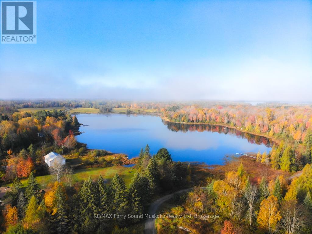 17 Ainslie Lake Road, Whitestone, Ontario  P0A 1G0 - Photo 8 - X12363299