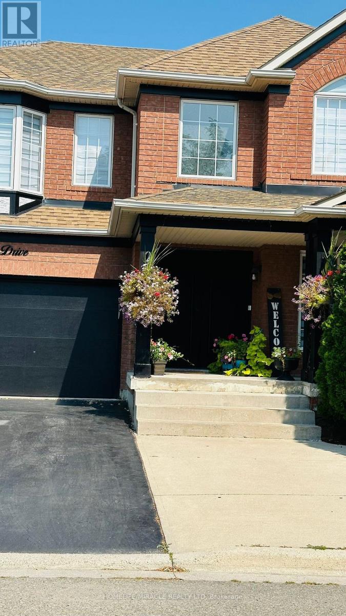 28 Bowsfield Drive, Brampton, Ontario  L6P 1A6 - Photo 2 - W12363249