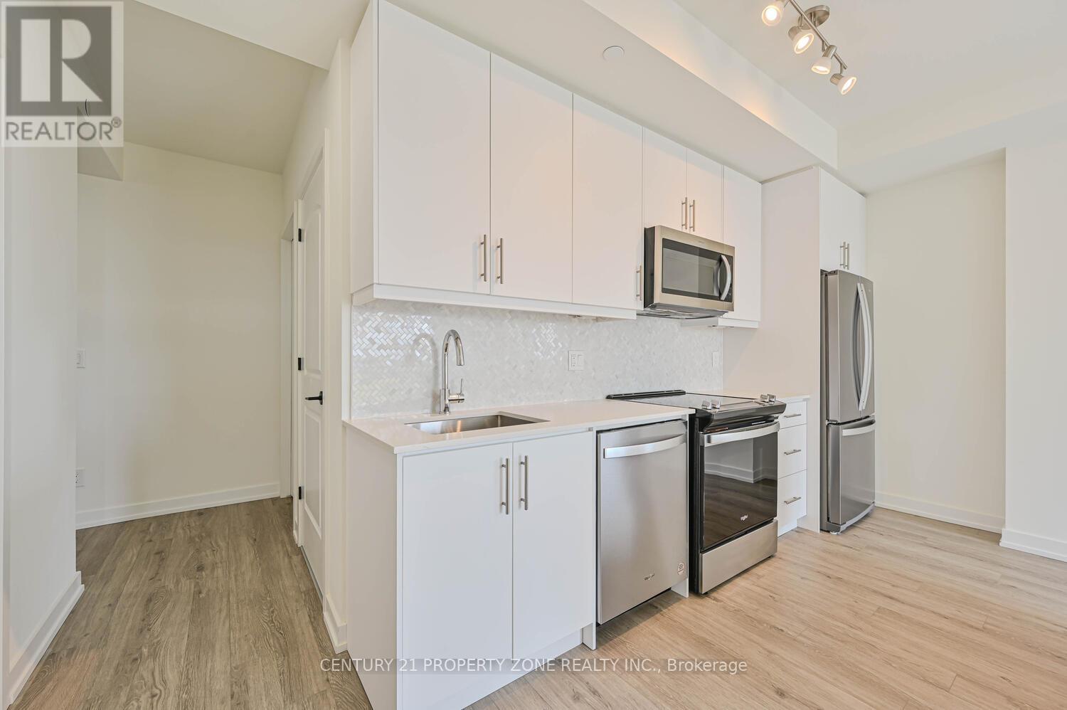 404 - 345 Wheat Boom Drive, Oakville, Ontario  L6H 7X4 - Photo 8 - W12363566
