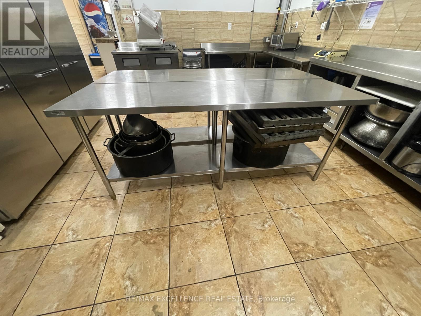 Unit E - 2241 Rymal Road E, Hamilton (Stoney Creek Mountain), Ontario  L8J 2V8 - Photo 10 - X12363556