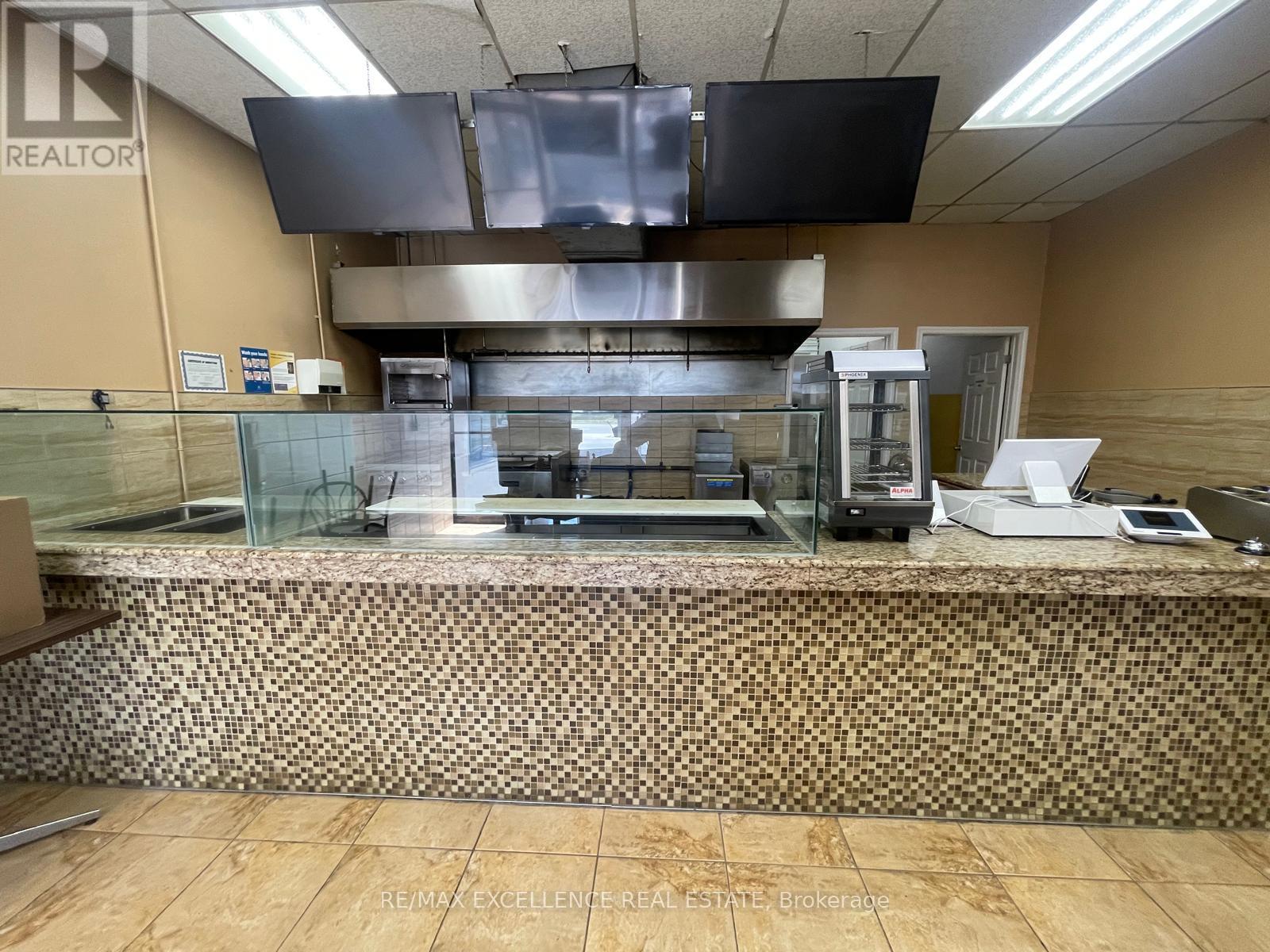 Unit E - 2241 Rymal Road E, Hamilton (Stoney Creek Mountain), Ontario  L8J 2V8 - Photo 4 - X12363556
