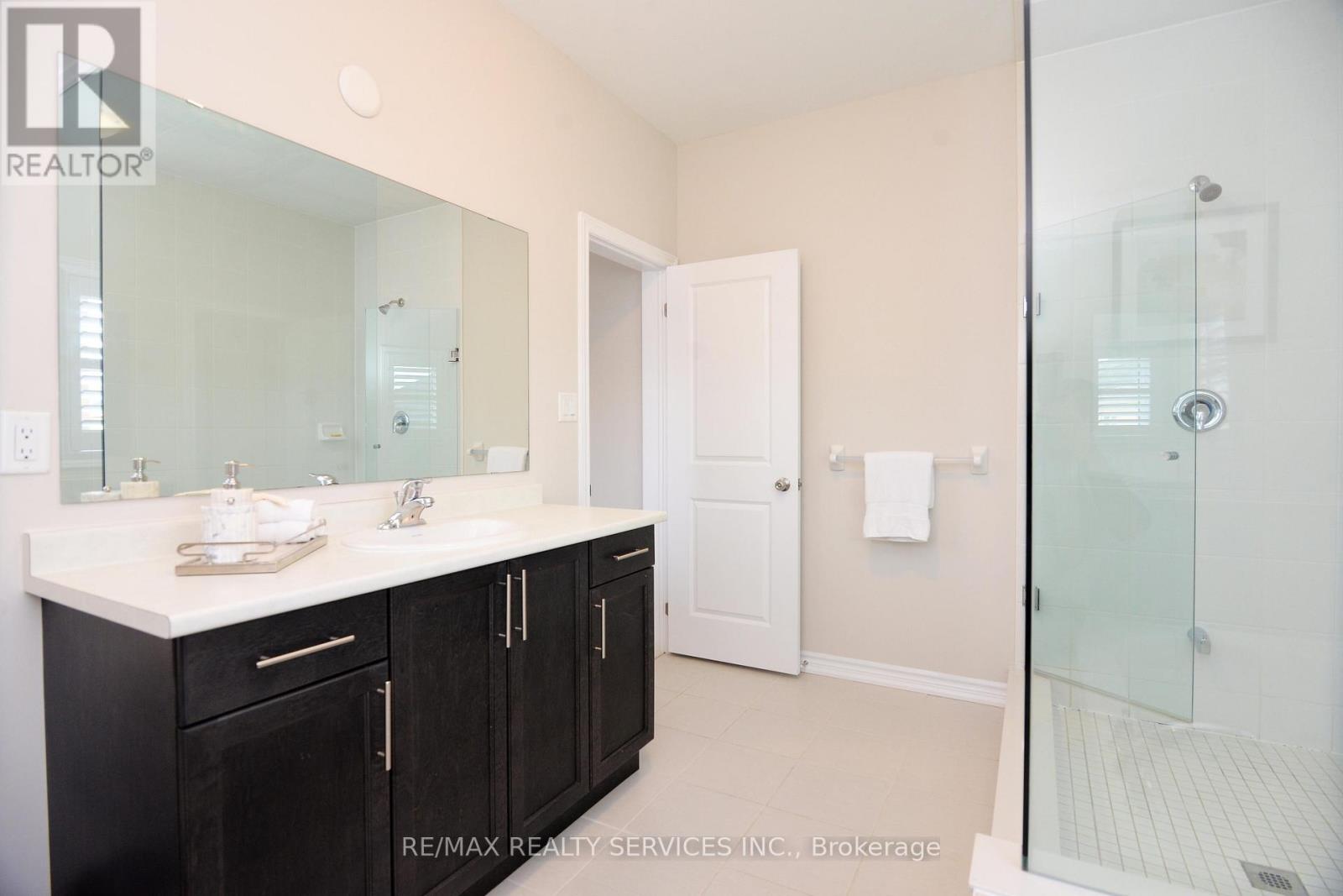 24 Bachelor Street, Brampton, Ontario  L7A 5A9 - Photo 30 - W12363713