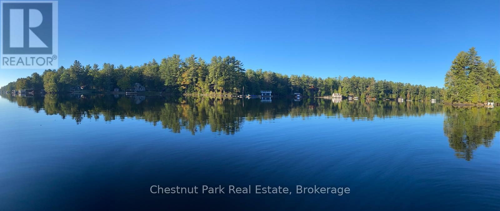 86 Taylor Island, Gravenhurst, Ontario  P1P 1R2 - Photo 1 - X12363817