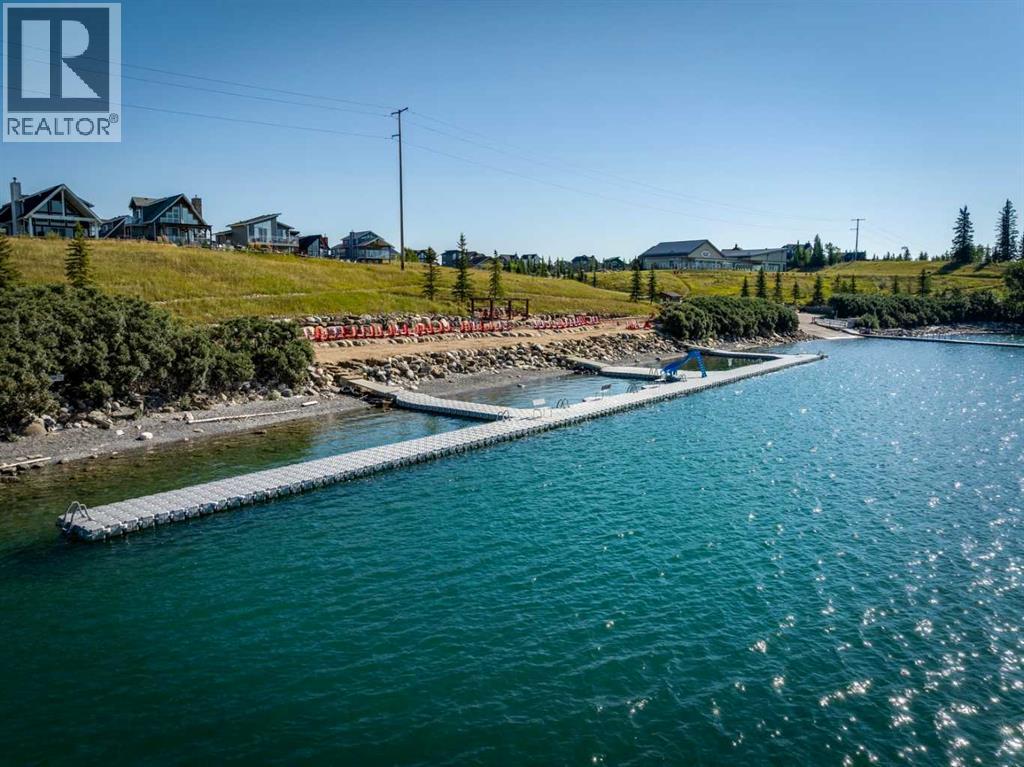 404 Cottageclub Grove, Rural Rocky View County, Alberta  T4C 1B1 - Photo 16 - A2251524