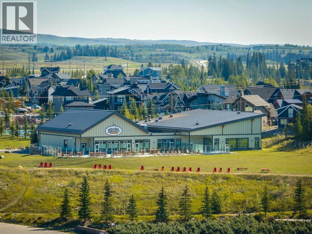 404 Cottageclub Grove, Rural Rocky View County, Alberta  T4C 1B1 - Photo 17 - A2251524