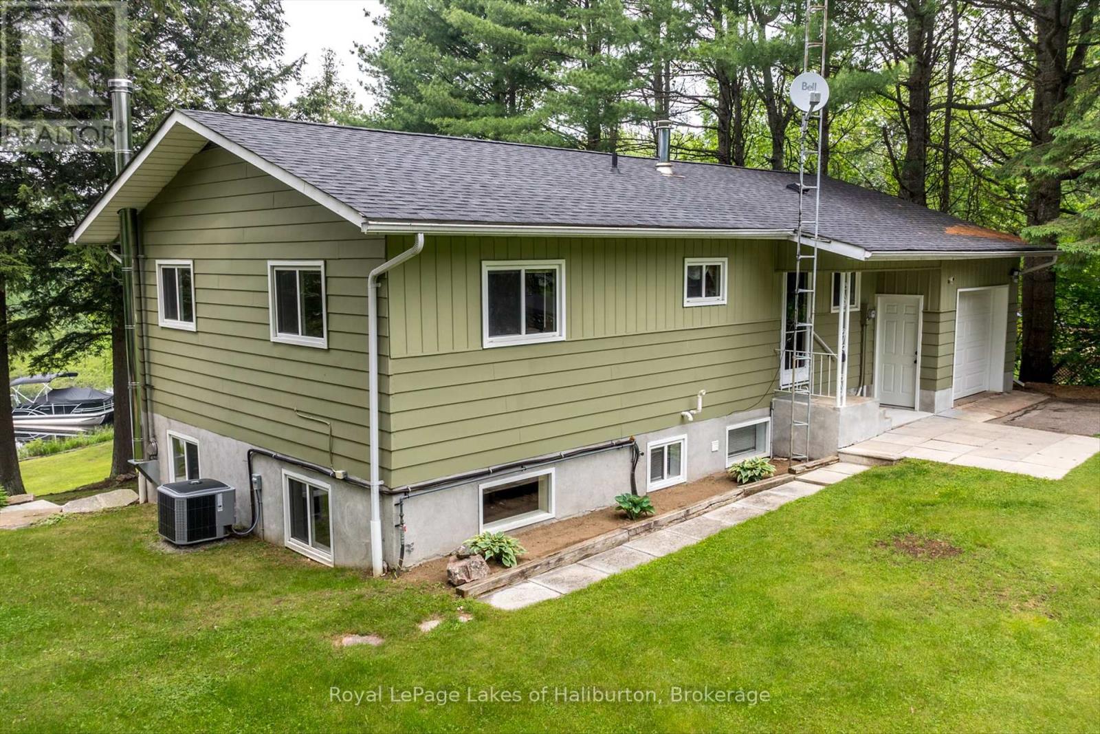 1093 Lamar Drive, Algonquin Highlands, Ontario  K0M 1S0 - Photo 2 - X12214308