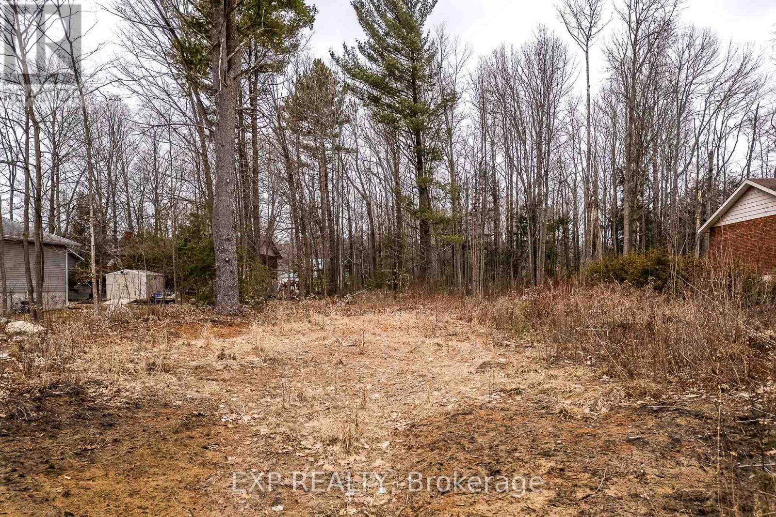 98 Rue Vanier, Tiny, Ontario  L9M 0J2 - Photo 2 - S12364403