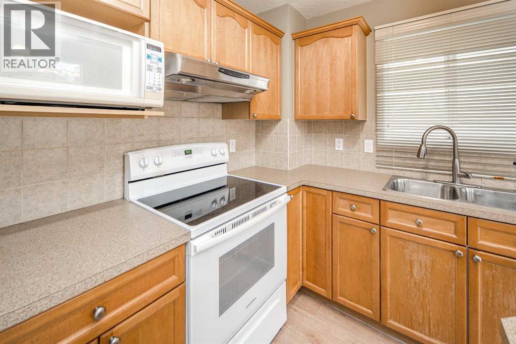 143 Covepark Green Ne, Calgary, Alberta  T3K 6L2 - Photo 6 - A2247889