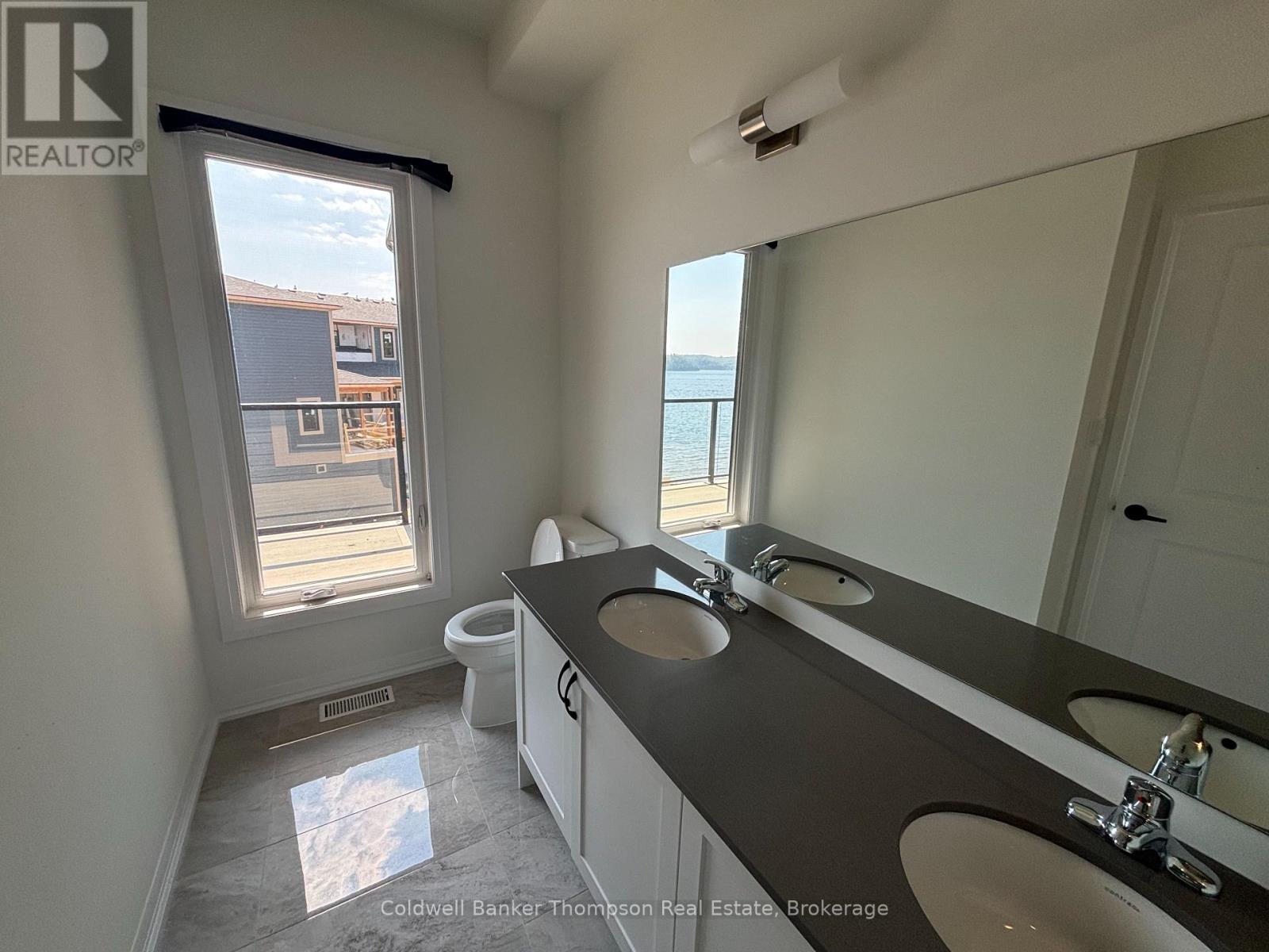 245 Crescent Bay Lane, Huntsville, Ontario  P1H 1B9 - Photo 13 - X12365339