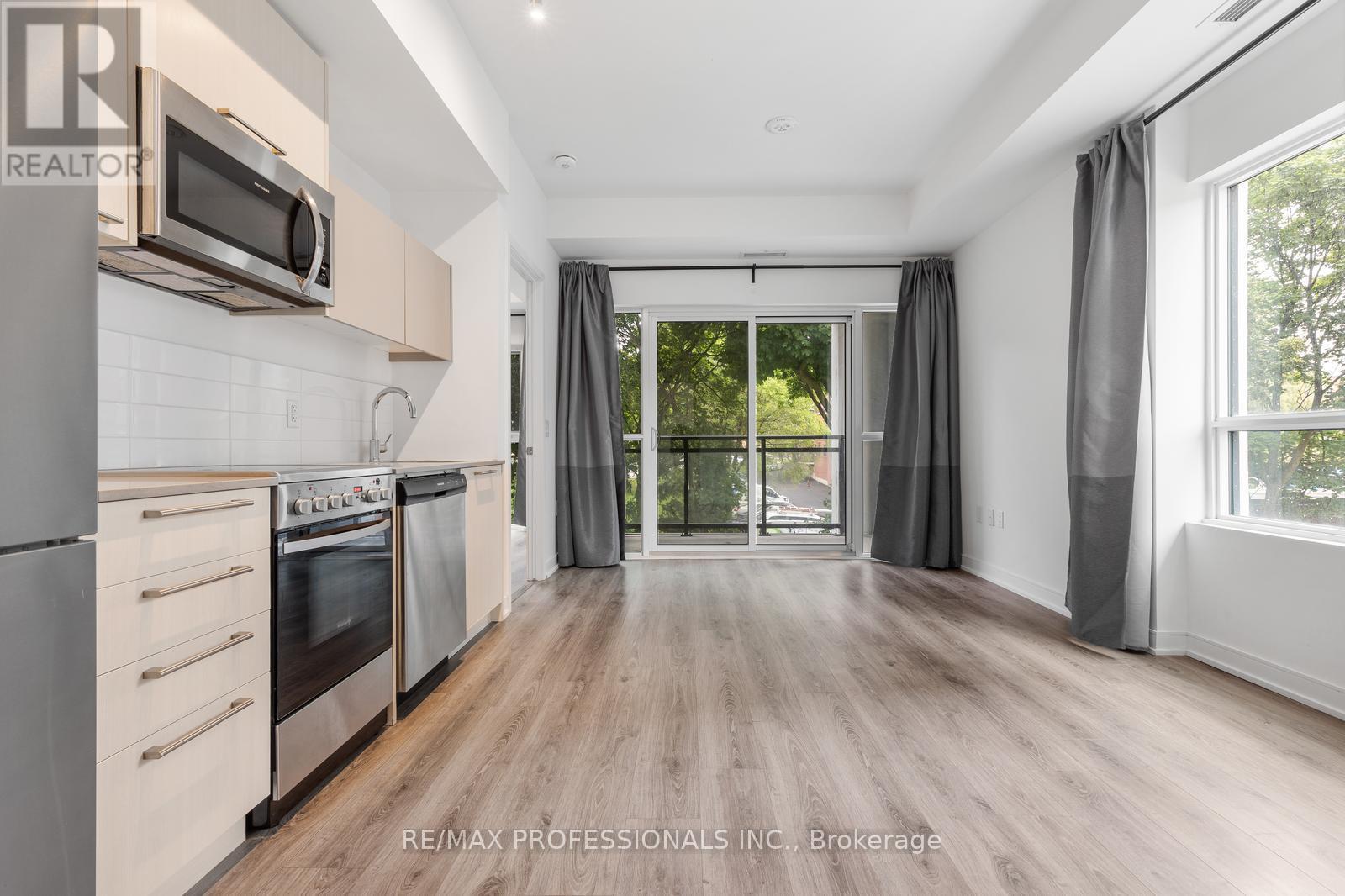 213 - 25 Neighbourhood Lane, Toronto, Ontario  M9Y 0C4 - Photo 3 - W12365184
