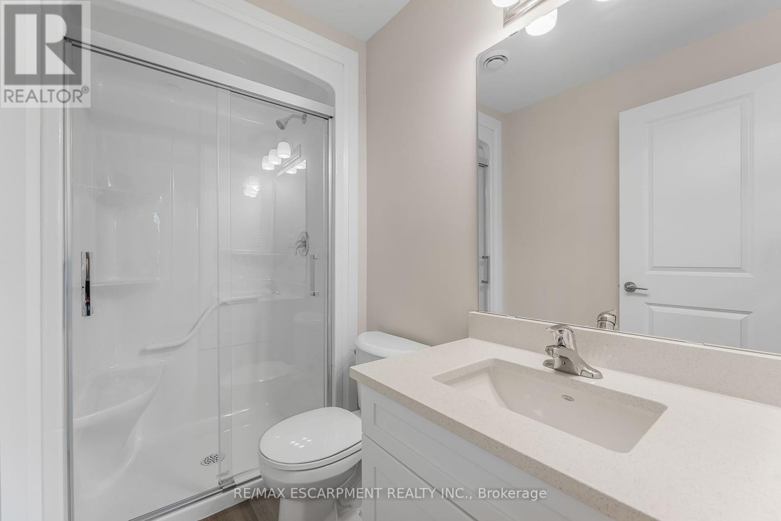 403 - 118 Summersides Boulevard, Pelham, Ontario  L0E 1E1 - Photo 5 - X12365377