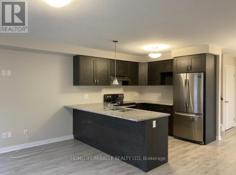 206 Sedgewood Street, Kitchener, Ontario N2P 0J5 - Photo 4 - X12365480