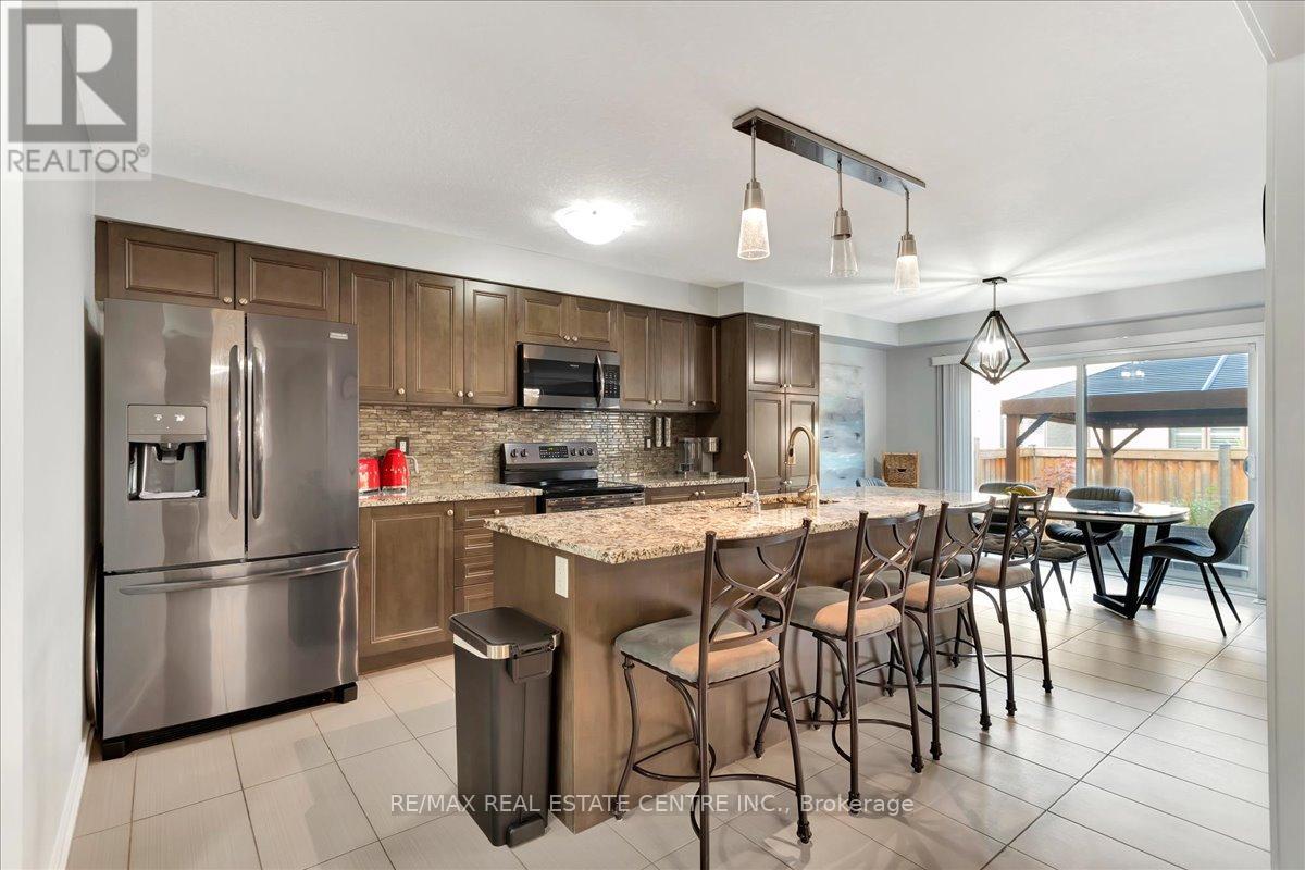 30 Scarletwood Street, Hamilton, Ontario  L8J 0K8 - Photo 6 - X12366423