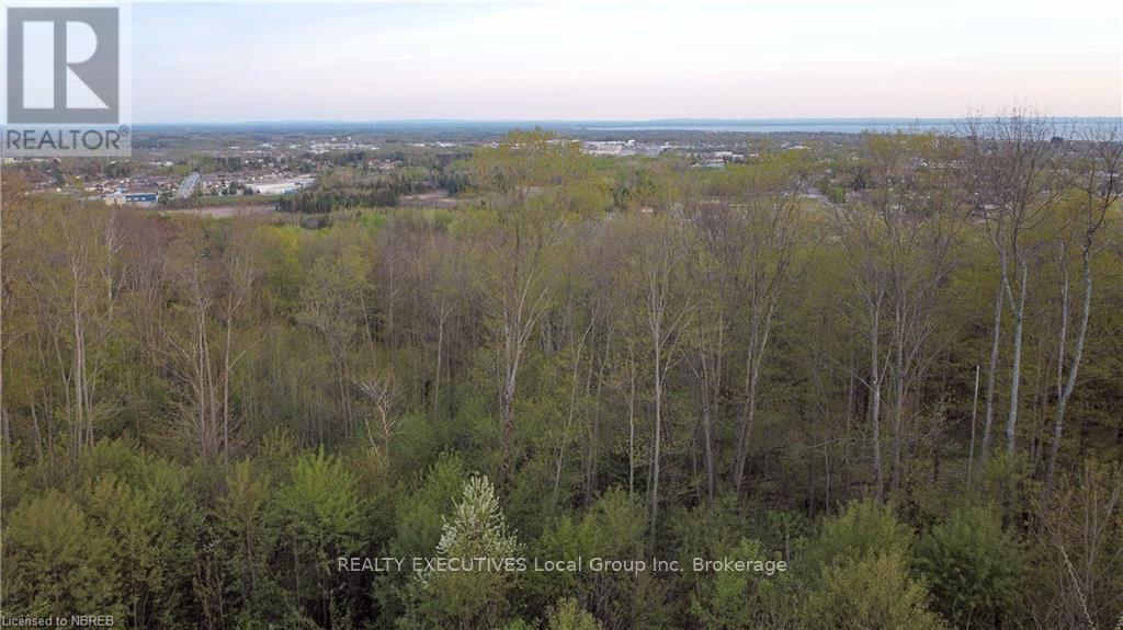 22 Kenreta Drive, North Bay (Airport), Ontario  P1B 8X6 - Photo 3 - X12367095