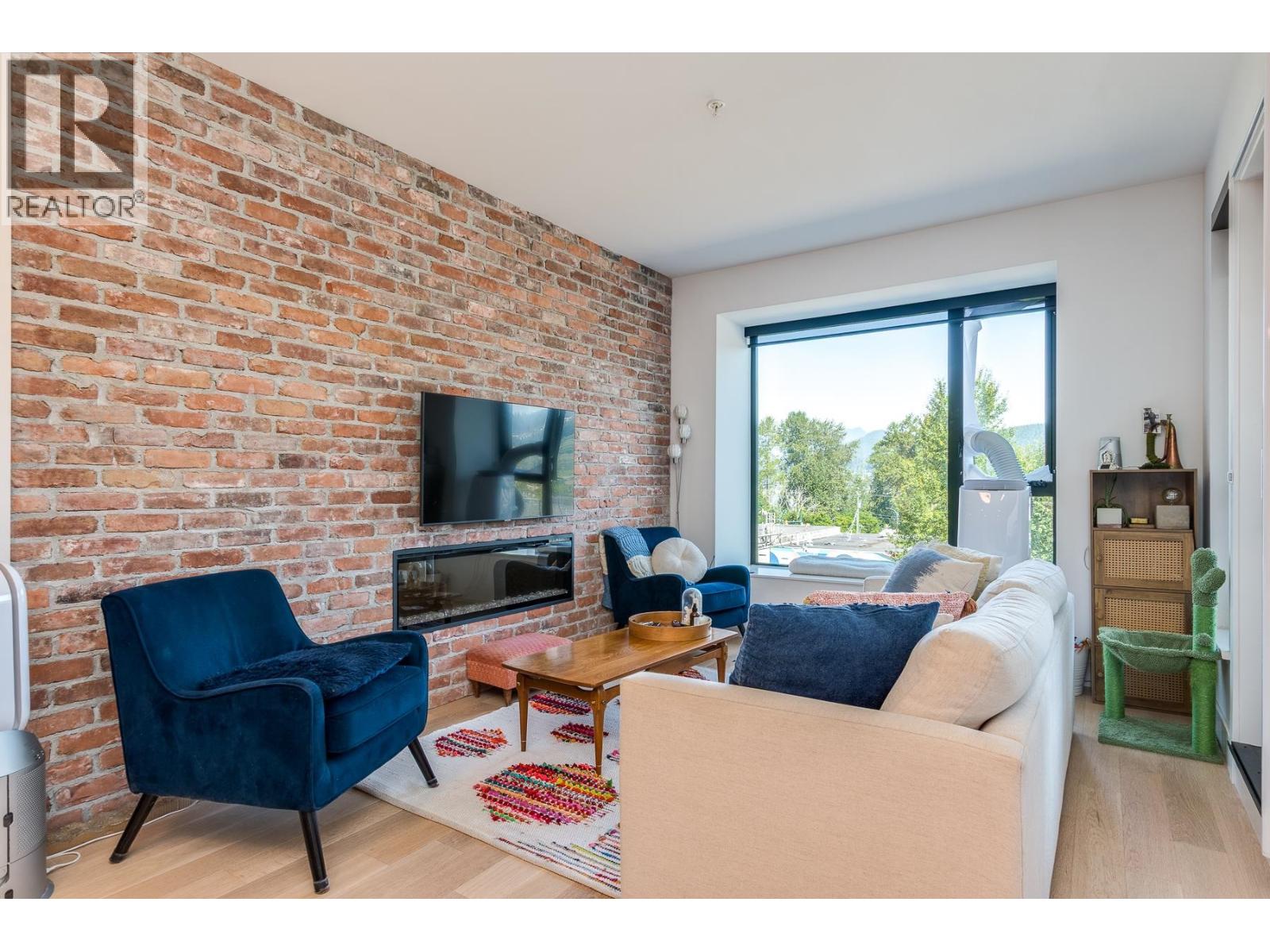 307 83 Moody Street, Port Moody, British Columbia  V3H 0K7 - Photo 1 - R3040991