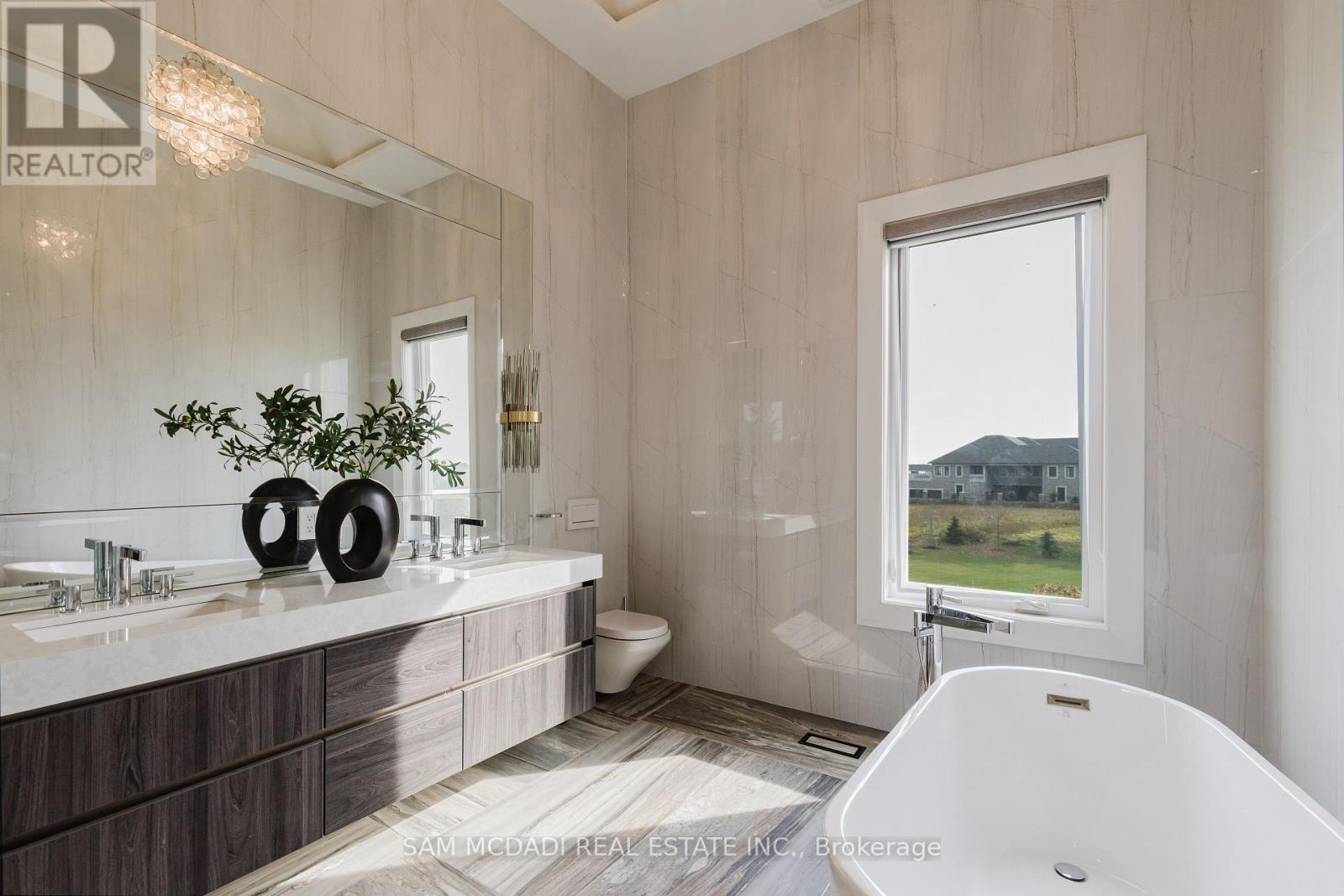 4 Saint Lukes Court, Brampton (Toronto Gore Rural Estate), Ontario  L6P 1K9 - Photo 34 - W12367492