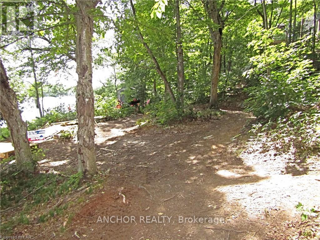 550 Shawanaga Lane, Mcdougall, Ontario  P0A 1G0 - Photo 27 - X12367840