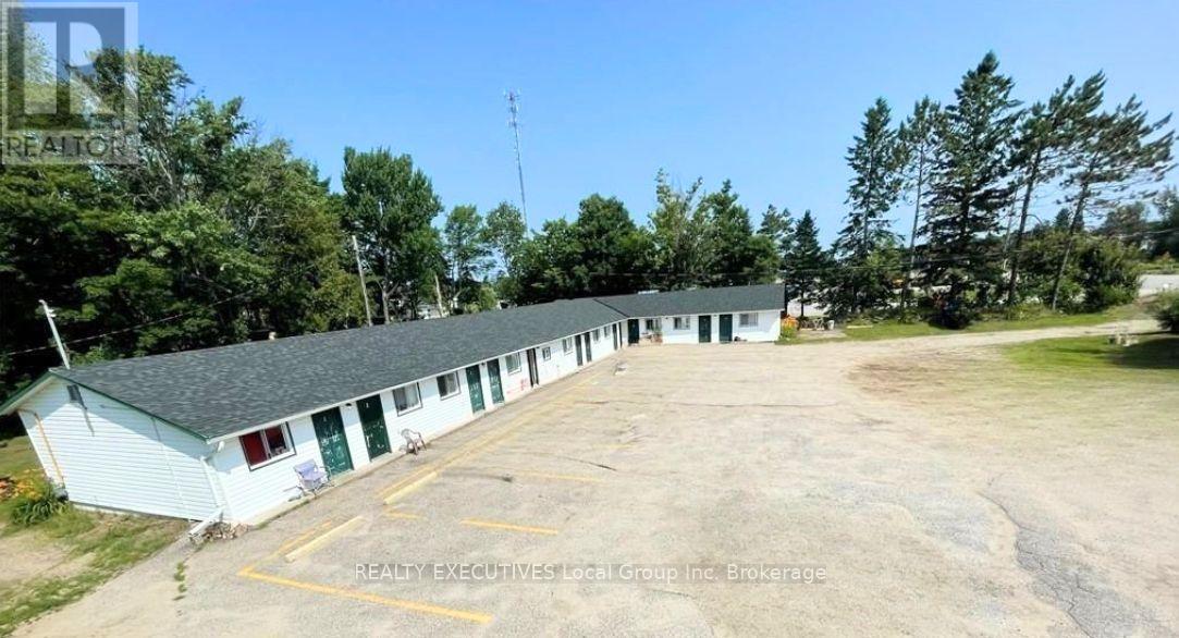 4319 Highway 11 N, North Bay (College Heights), Ontario  P1B 8G3 - Photo 1 - X12368096