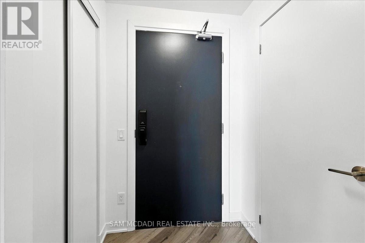 722 - 405 Dundas Street W, Oakville, Ontario  L6M 5P9 - Photo 2 - W12368361
