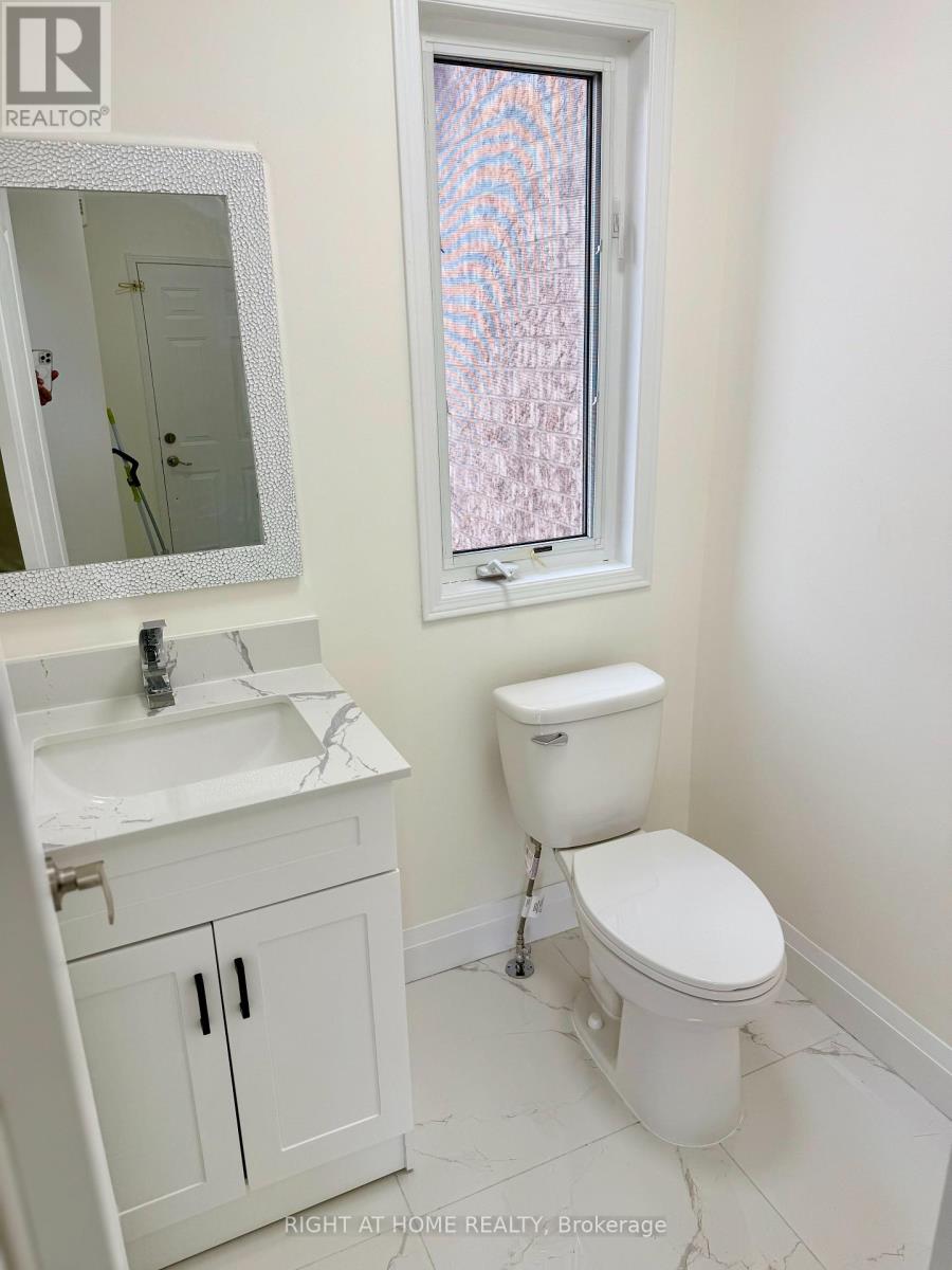 32 Hocken Court, Brampton (Sandringham-Wellington), Ontario  L6R 2T7 - Photo 9 - W12368445