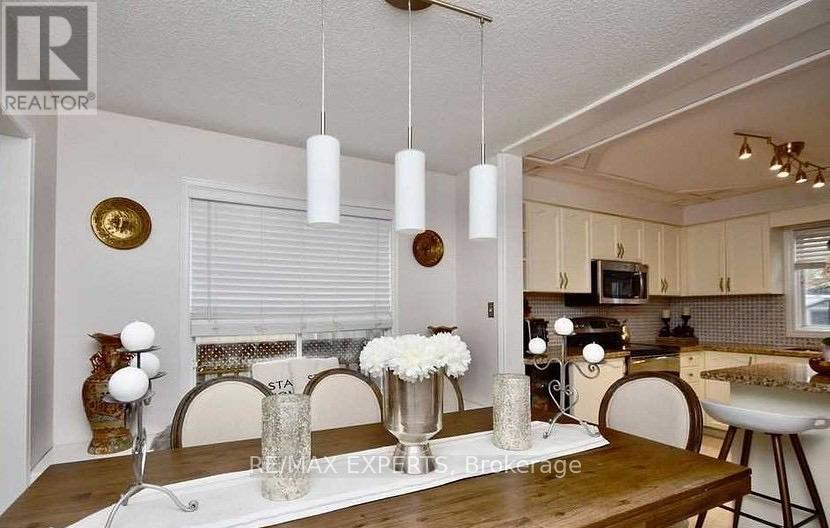 63 Barwick Drive, Barrie, Ontario  L4N 6Z5 - Photo 4 - S12368673