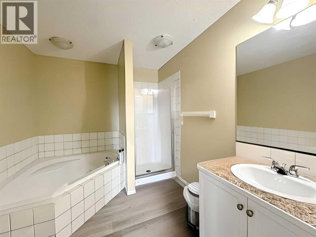101 Channelside Cove Sw, Airdrie, Alberta  T4B 3J1 - Photo 12 - A2231673