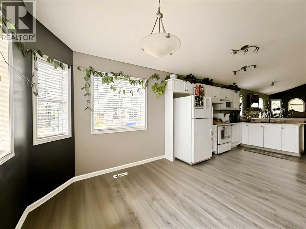 101 Channelside Cove Sw, Airdrie, Alberta  T4B 3J1 - Photo 10 - A2231673
