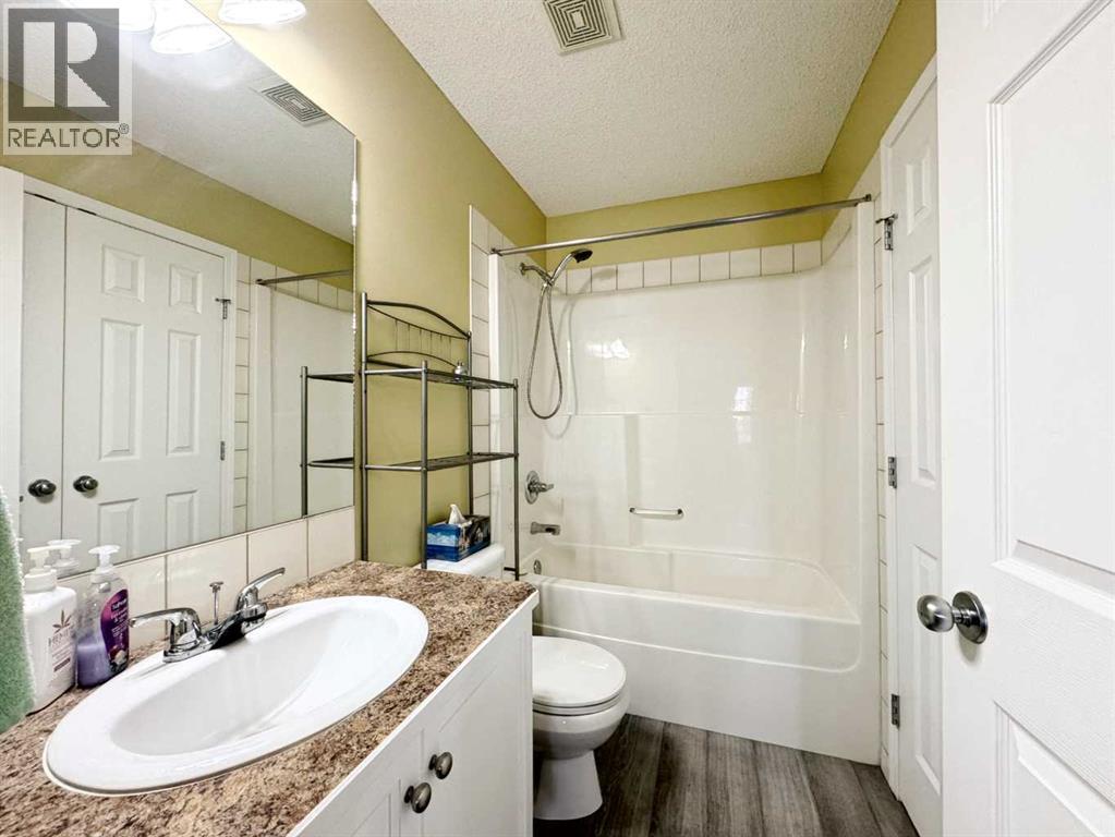 101 Channelside Cove Sw, Airdrie, Alberta  T4B 3J1 - Photo 14 - A2231673