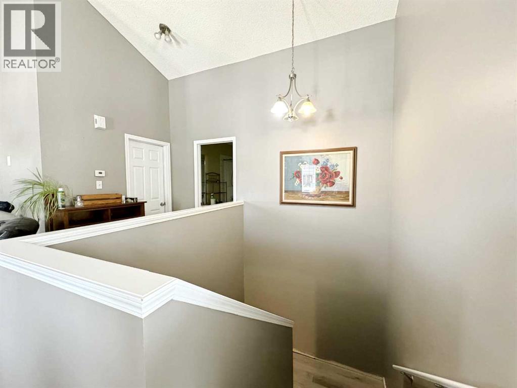 101 Channelside Cove Sw, Airdrie, Alberta  T4B 3J1 - Photo 6 - A2231673