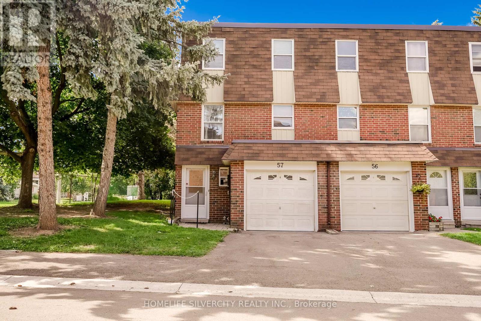 57 - 235 Bronte Street S, Milton, Ontario  L9T 3V8 - Photo 1 - W12369111