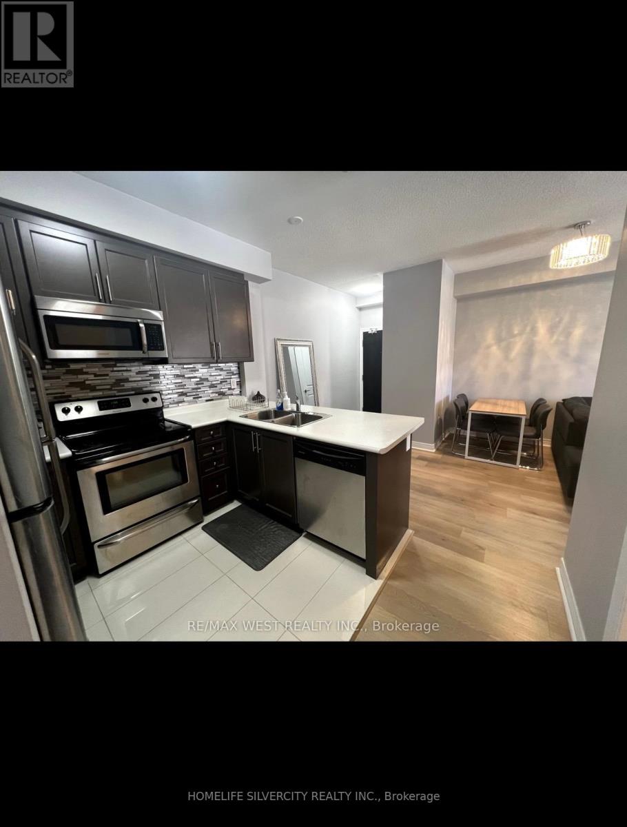 305 - 269 Georgian Drive, Oakville, Ontario  L6H 0L3 - Photo 7 - W12369287