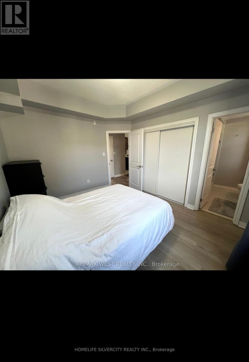 305 - 269 Georgian Drive, Oakville, Ontario  L6H 0L3 - Photo 9 - W12369287