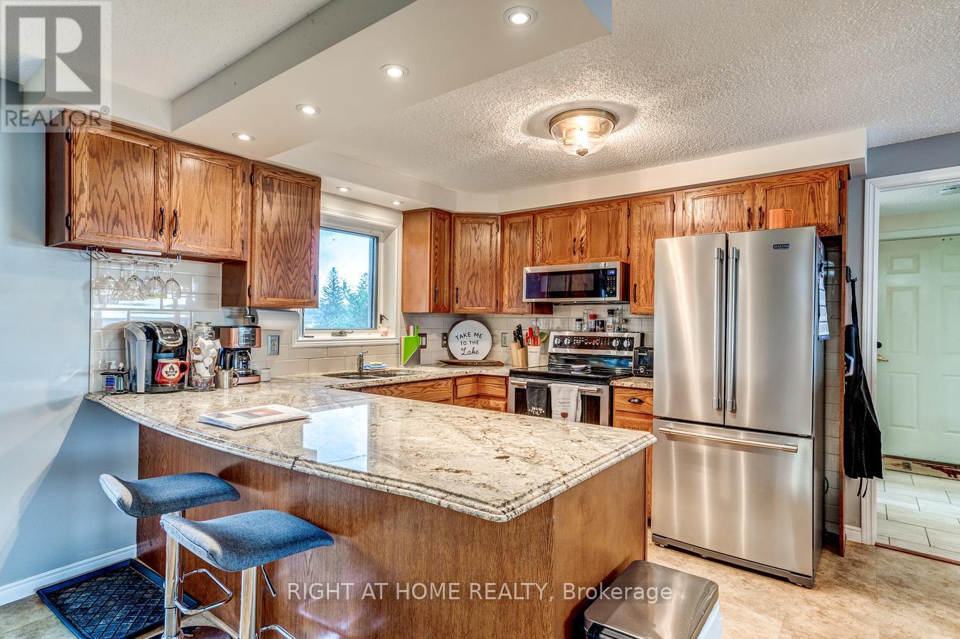 138 Starr Boulevard, Kawartha Lakes, Ontario  K0M 2C0 - Photo 3 - X12368504