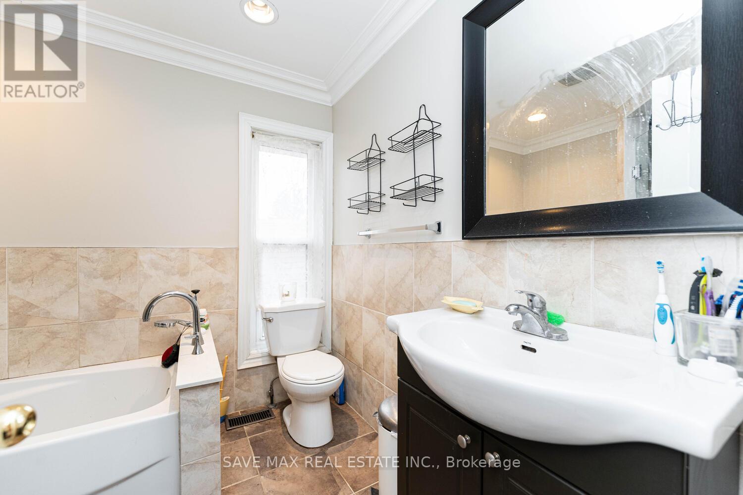 73 Buttonwood Avenue, Toronto, Ontario  M6M 2H9 - Photo 14 - W12369769
