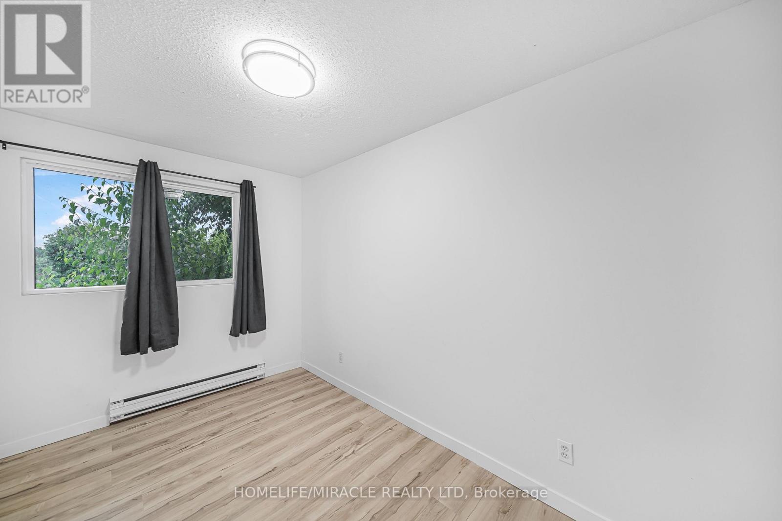 305 - 323 Main Street W, Merrickville-Wolford, Ontario  K0G 1N0 - Photo 15 - X12369935