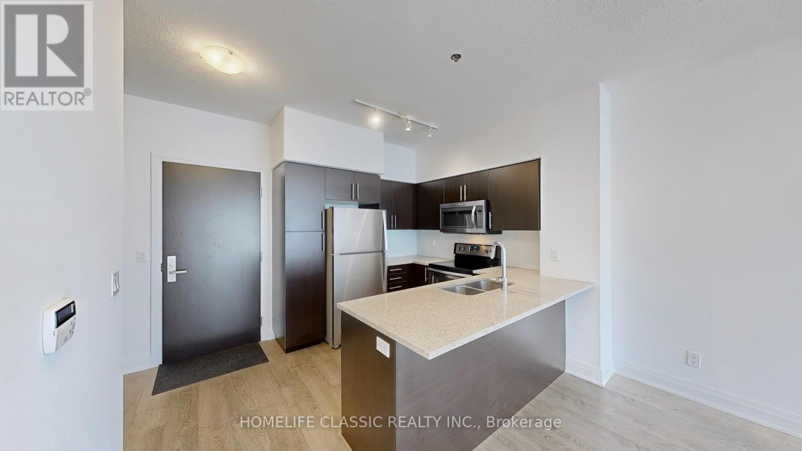 507 - 55 Speers Road, Oakville, Ontario  L6K 0H9 - Photo 3 - W12370004