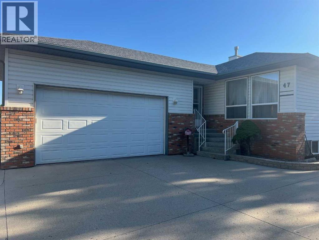 47 Squamish Boulevard W, Lethbridge, Alberta  T1K 7J7 - Photo 2 - A2252400